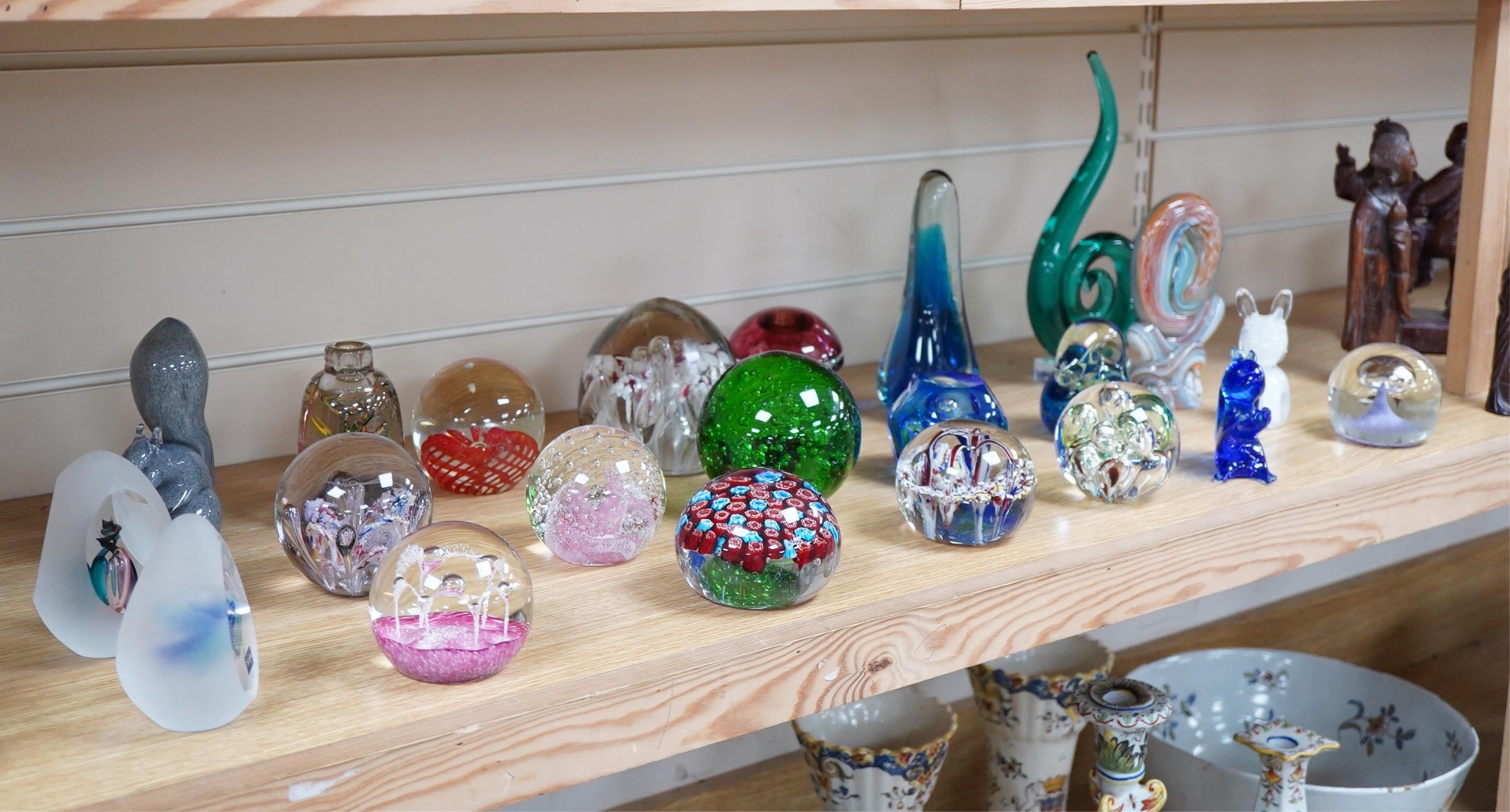 A large collection of 20th century paperweights to include Svaja, Mdina and some novelty examples in the form of animals, largest 27cm high